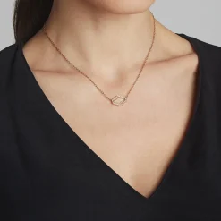 BELL 18K AND DIAMOND ELONGATED HEXAGONAL ROCK CRYSTAL PENDANT