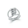 HUXLEY STERLING SILVER SINGLE COIL LINK RING