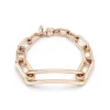 MORRELL 18K GOLD GRADUATING CHAIN LINK BRACELET WITH ELONGATED LINK