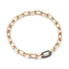 SAXON 18K GOLD CHAIN LINK BRACELET WITH ELONGATED BLACK DIAMOND CLASP